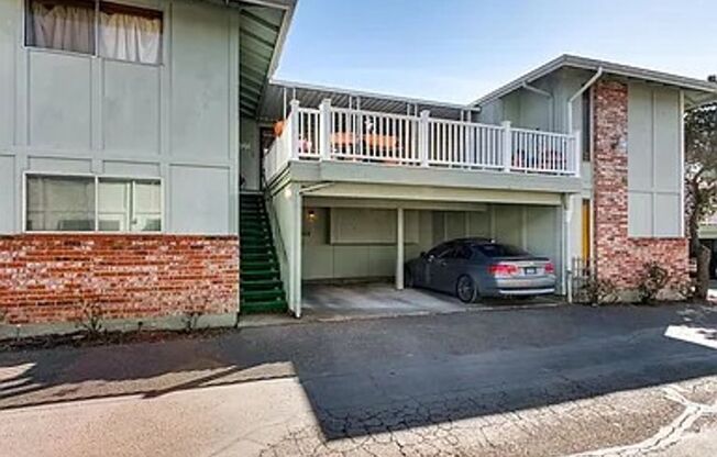 Updated Top-Floor 2 Bedroom Condo with Open Layout, Updated Kitchen & Spacious Balcony