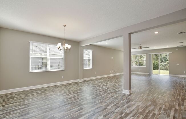 Gorgeous 4/3 Spacious Home with a 2 Car Garage Located on a Conservation Lot in Creekstone Neighborhood – Orlando!