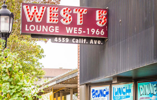 West 5 Lounge Neon Sign on Building