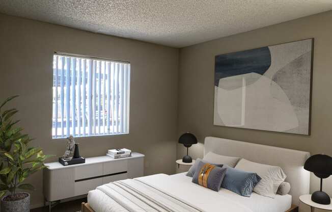 a bedroom with a bed and a dresser and a window