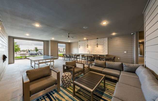 Cromwell at Plum Creek Apartments Clubhouse with Seating and Ping Pong Table