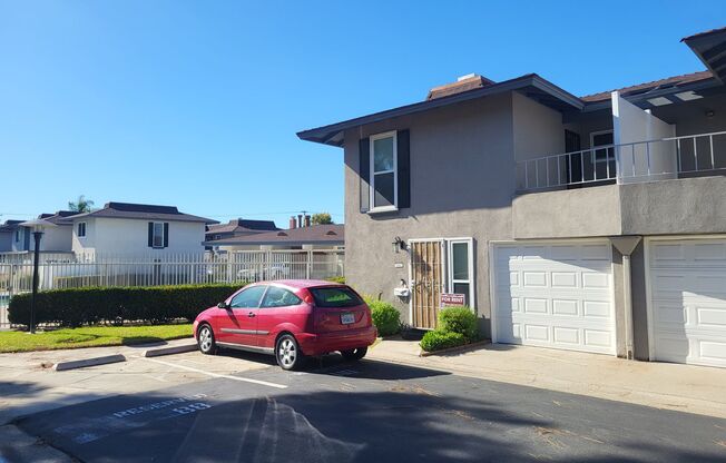 Two story Cypress townhouse, garage, patio, laundry and pool access