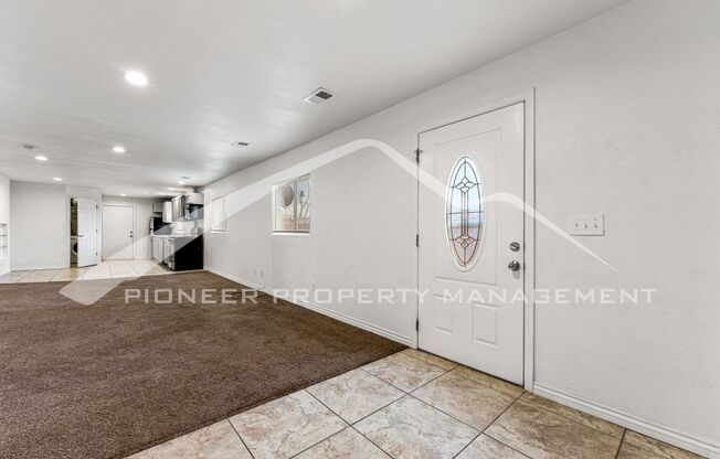 Lower Level Half Duplex with Two Car Garage and Fenced Yard