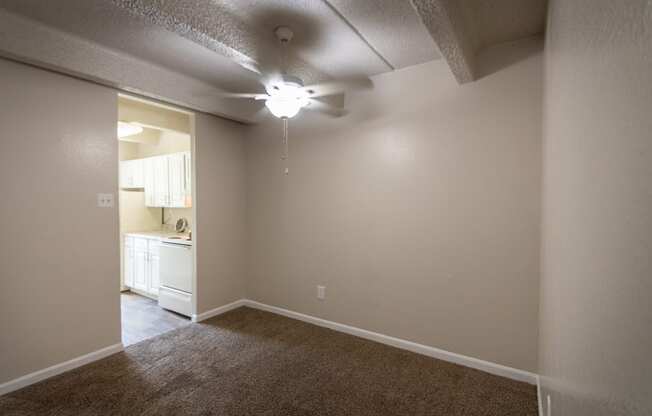 This is a photo of the dining area in the 965 square foot 2 bedroom, 2 bath  apartment at Harvard Square Apartments, in Dallas, TX.