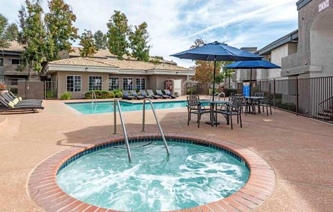 Waterstone at Murrieta Apartments in Murrieta, California Pool with Lounge Chairs and Hot Tub