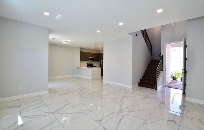 Charming Mediterranean-Style Townhome in Gated Community
