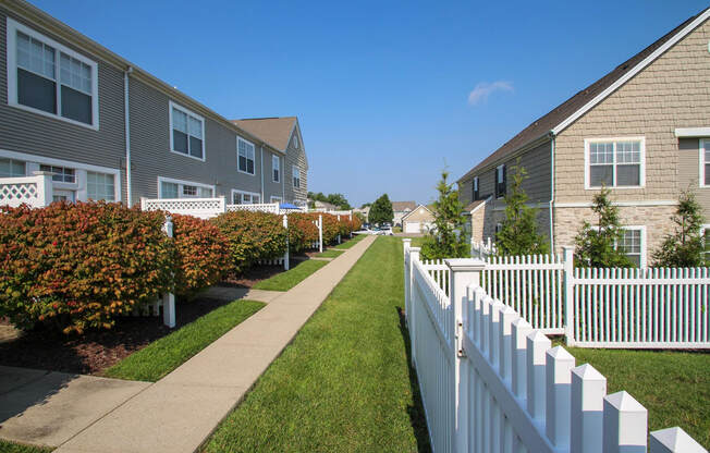 This is a picture of patios and building exteriors at Nantucket Apartments, in Loveland, OH.