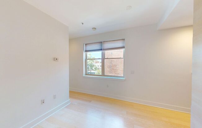 Top Floor Updated One Bedroom W/Sleek Appliances, Washer/Dryer Combo in Amazing Location!