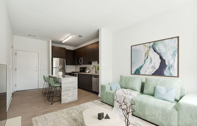 a living room with a couch and a table at The Box, Richmond, 23224