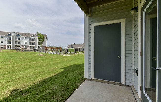 Lush, Green Pond Views from Private Patio at Dodson Pointe Apartment Homes, Rogers, AR, 72758