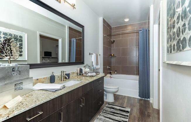 a kitchen with a sink and a mirror