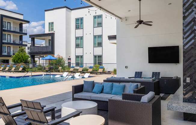 Rhythm Covered Pool Area with Outdoor TV and Seating