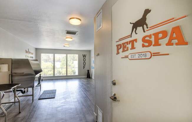 Entrance to the community pet spa.  Spa includes large stainless tub for washing.