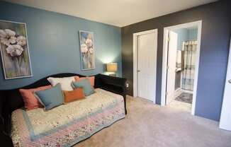 Spacious bedroom at Mason Hills Apartments in Mason, MI