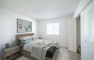 a bedroom with a bed and a dresser at Kirkwood Meadows, Pocatello, Idaho