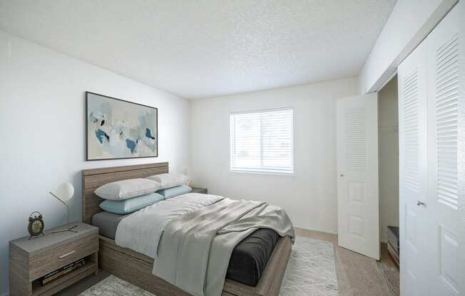 a bedroom with a bed and a dresser at Kirkwood Meadows, Pocatello, Idaho