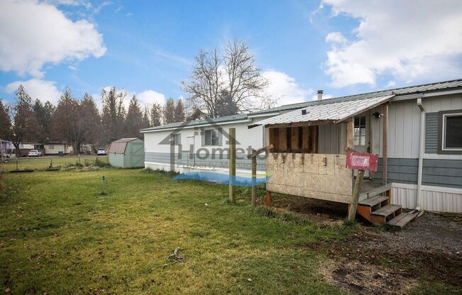 Spacious 2 bed 1.5 bath mobile on a large lot in Rathdrum!