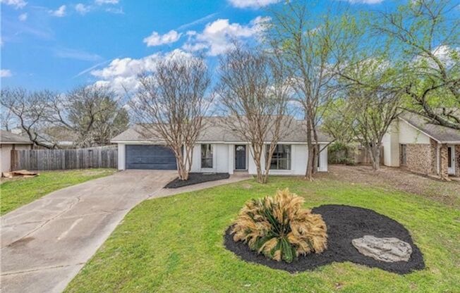 College Station - 3 bedroom - 2 bath house with garage and fenced back yard.