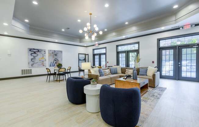 Summermill at Falls River Apartments co-working area with lounge seating and tables