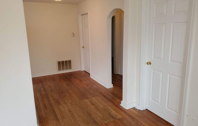 2 bd, 1 ba house, hardwoods, new paint, fenced with shed, w/d included, mowing provided, north central location near Business Loop