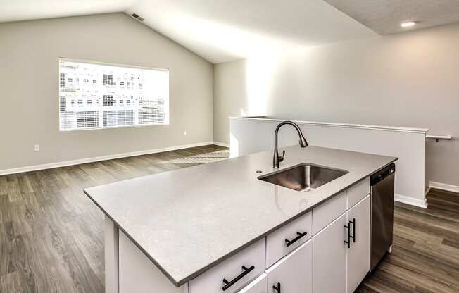 Studio, one two and three bedroom apartments and townhomes featuring open concept floor plans, dens, large windows, stainless steel appliances, quartz countertops, eat-in kitchens, pantries, LVT flooring and much more at The Trails at North Streams in Omaha, NE