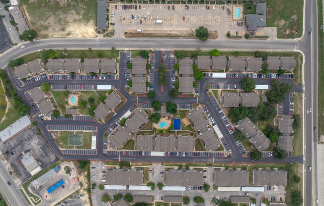 a bird s eye view of a neighborhood with rows of houses