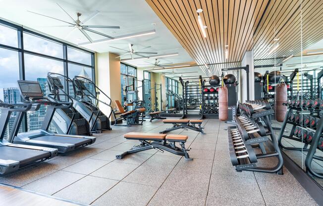 A fully equipped fitness center with skyline views supports every workout, with Midtown Atlanta just moments away for balance beyond the gym.