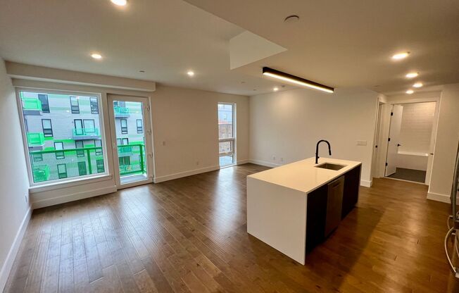 Stunning 2-Bed/2-Bath Condo with One-Car Garage and Rooftop Deck! Available NOW!