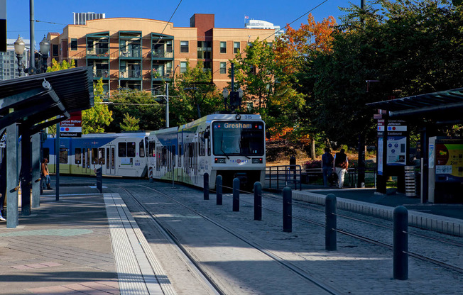 MAX train near Collins Circle Apartment