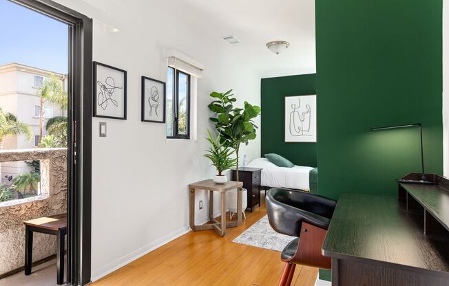 A fully furnished 4 bedroom, 2 bathroom apartment with common areas at 1823 Pelham Ave. Unit 5
