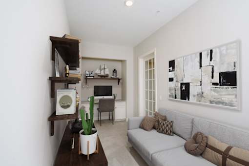 a living room with white walls and a gray couch at Fairfax, Grandview, OH, 43212