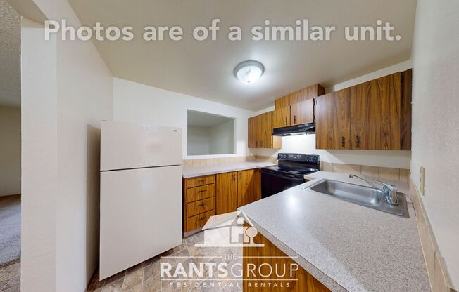 Lovely, wooded 2-bedroom apartment with a large private deck and in-unit washer & dryer!