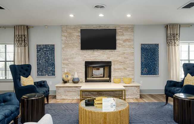 a living room with a fireplace and a television