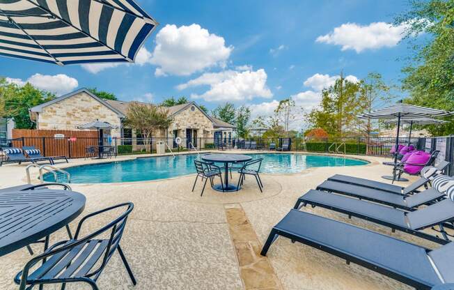 the preserve at ballantyne commons pool and tables with umbrellas