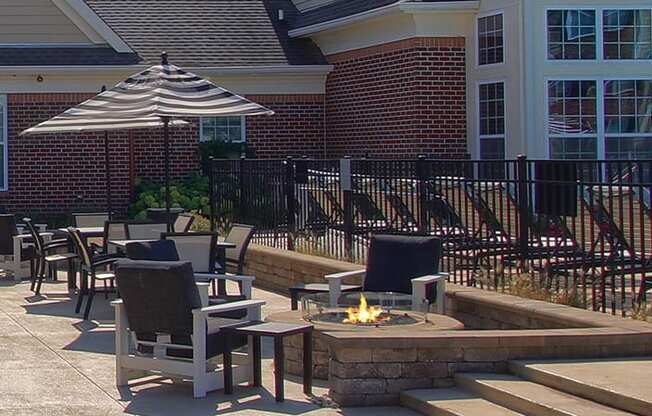 Outdoor sitting with fireplace at The Avenue at Polaris Apartments, Columbus, OH