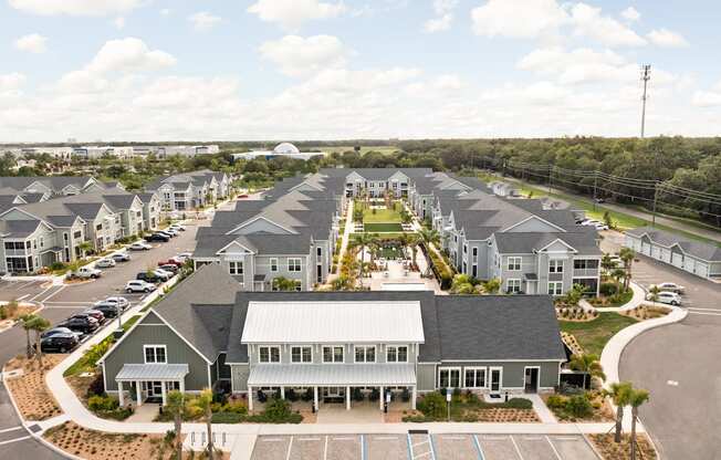 an aerial view of a large group of houses in a parking lot at Palm Grove in Ellenton, FL 34222