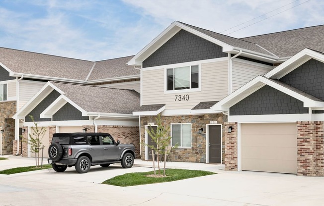 a truck parked in front of a house