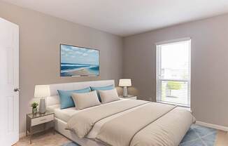 A bedroom with a large bed and a painting on the wall.