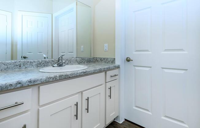 Apartments in Leander TX - Hills at Leander Expansive Bathroom with a Large Vanity, Shower, and Much More