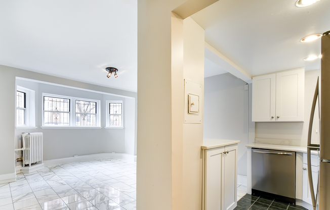 Newly Renovated Two Bedroom One Bath Condo For Rent With Elegant Marble Flooring, Stainless Steel Appliances, Custom Kitchen, & Sleek Hardwoods!