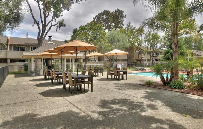 Poolside Dining Tables at Balboa Apartments, California