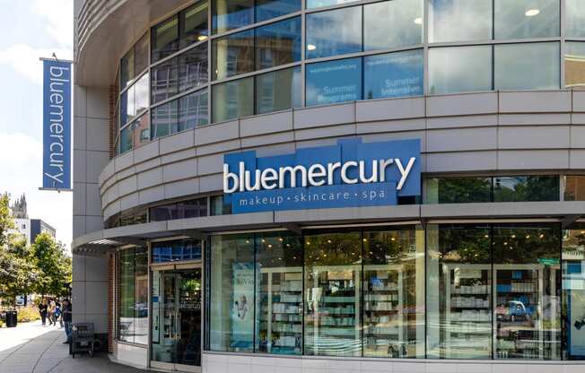 the facade of a building with a blueemedurgy sign on the side of it