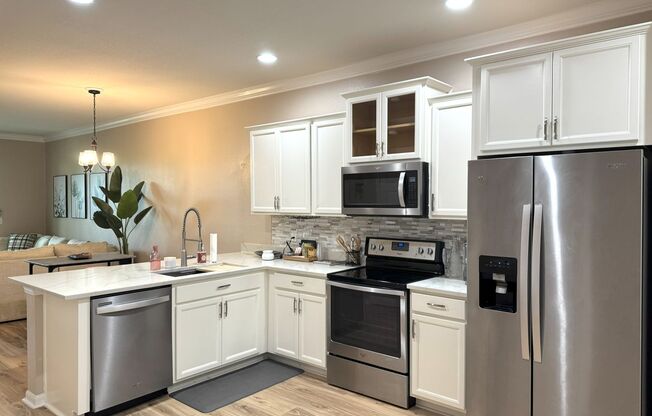 Updated Townhome in Gated Magnolia Park!