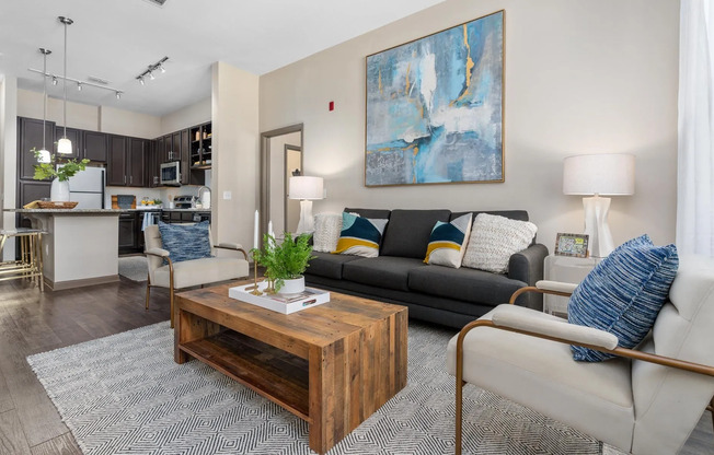 Open Living Room and Kitchen at RiverHouse Apartments in Little Rock, AR