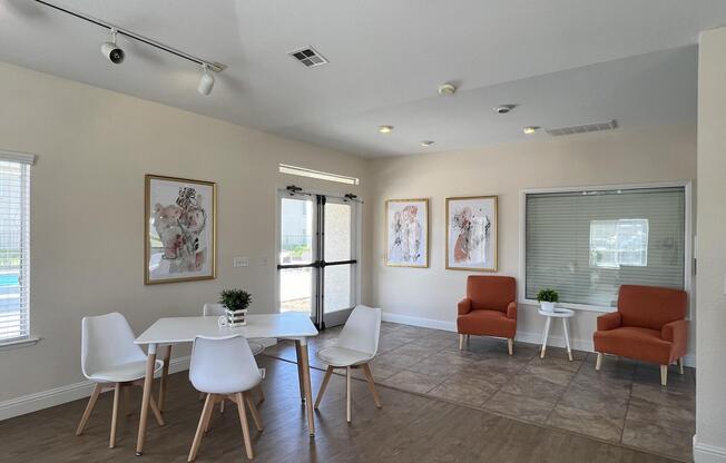 a living room filled with furniture and a large window