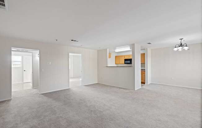 the spacious living room and kitchen in a new home at Dronfield Astoria Sylmar, 91342