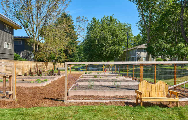 Community garden fenced in for residents to plant vegetables, herbs and more.at Woodhaven, Everett