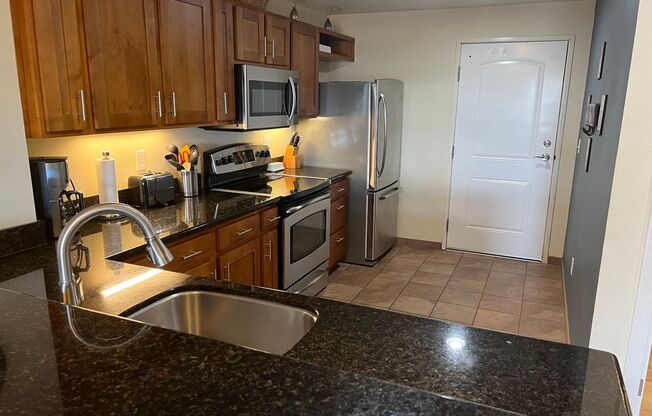 Top-Floor Ocean View Condo Across from the Beach | Furnished 2BR + Central A/C
