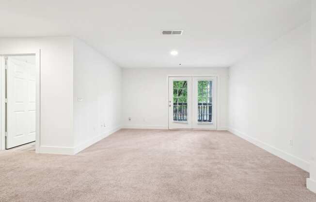 Living room with carpet and window