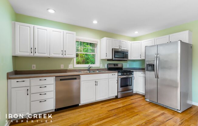 Charming Three-Bedroom Home with Solar Power and Fenced Yard in Asheville